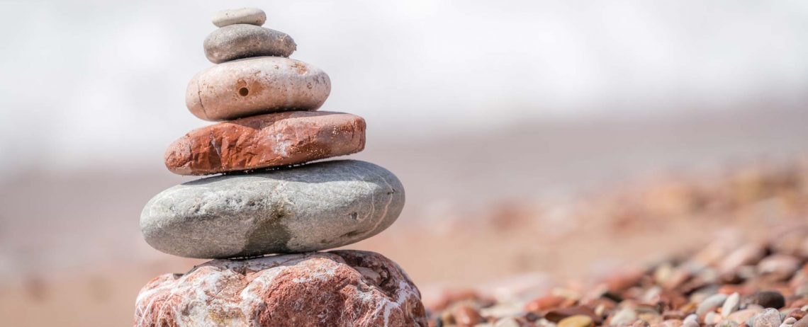 zen-balanced-small-pile-of-stacked-stones-GR5MQKW.jpg